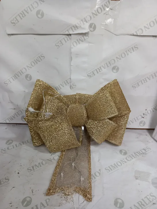 GOLD BATTERY OPERATED DOOR BOW  RRP £19.99