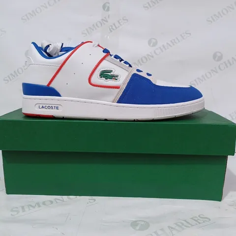 BOXED PAIR OF LACOSTE SHOES IN WHITE/BLUE/RED UK SIZE 10