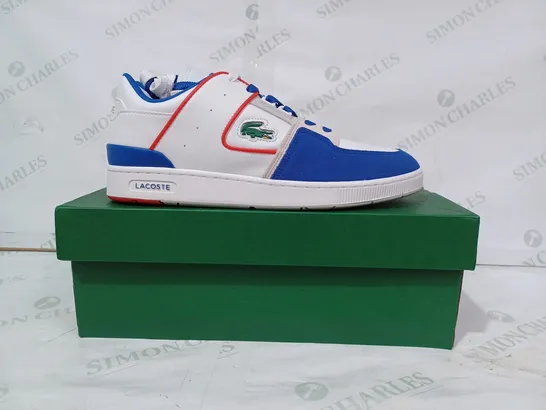 BOXED PAIR OF LACOSTE SHOES IN WHITE/BLUE/RED UK SIZE 10