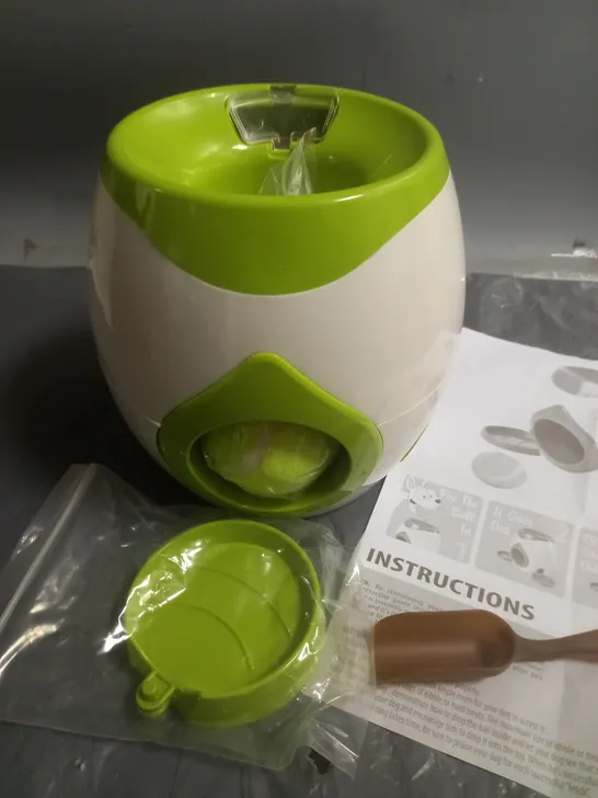 TENNIS BALL PET TREAT DISPENSER AND GAME