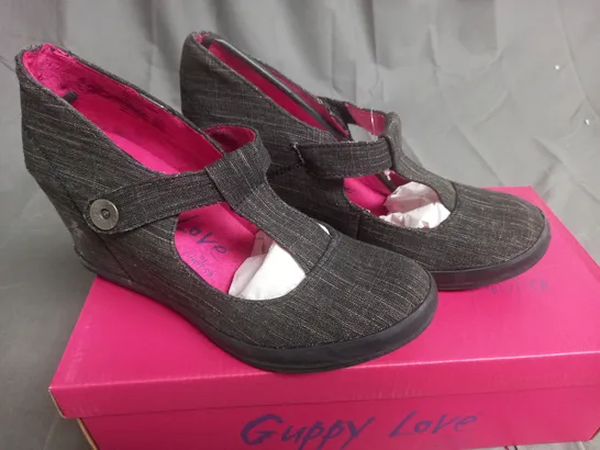 BOX OF APPROXIMATELY 12 BLACK  GUPPY LOVE BY BLOWFISH SHOES IN VARIOUS SIZES 