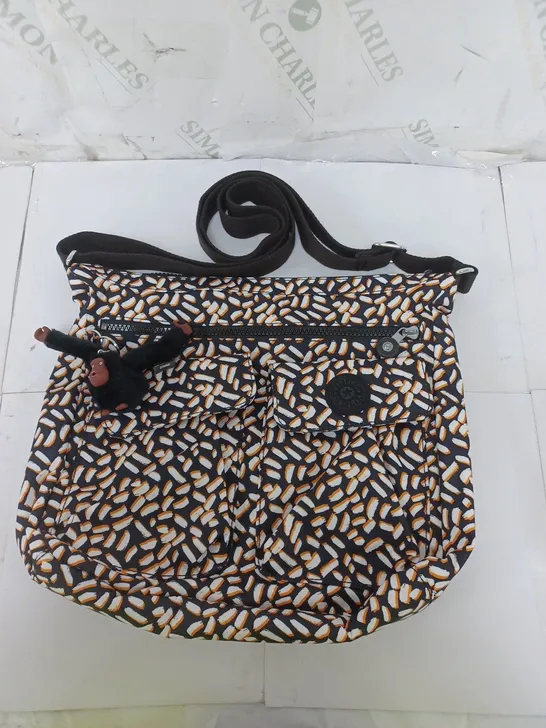 KIPLING SHOULDER BAG IN BLACK/WHITE/ORANGE PRINT WITH MONKEY ACCESSORY 