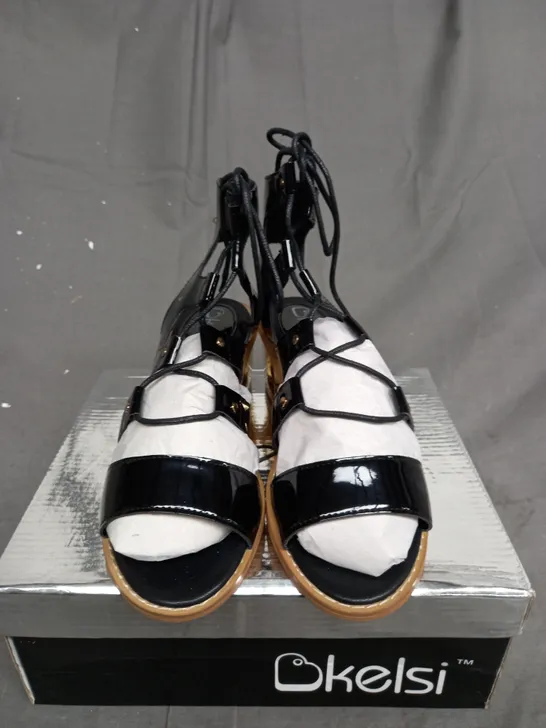 BOX OF APPROXIMATELY 12 BOXED KELSI WEDGED SANDAL SHOES IN VARIOUS SIZES