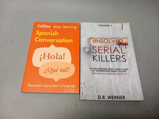 TWO ASSORTED BOOKS TO INCLUDE; VOLUME 1 UNSOLVED SERIAL KILLERS AND SPANISH CONVERSATION