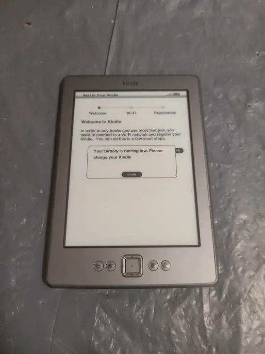 UNBOXED KINDLE DO1100 E-READER IN SILVER