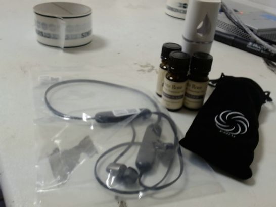 FANU WITH ESSENTIAL OILS AND SONY EARPHONES