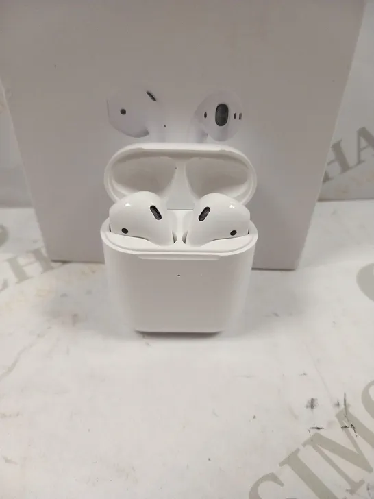 BOXED APPLE AIR PODS WITH WIRELESS CHARGING CASE