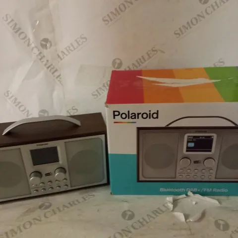 POLAROID AM/FM RADIO IN BLACK