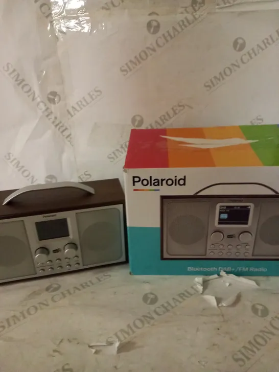 POLAROID AM/FM RADIO IN BLACK