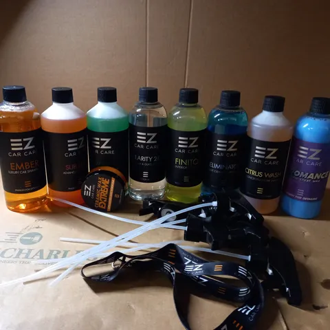 BOX OF EZ CAR CARE ITEMS TO INCLUDE PRE WASH, SPRAY TOPS AND WINDOW CLEANER