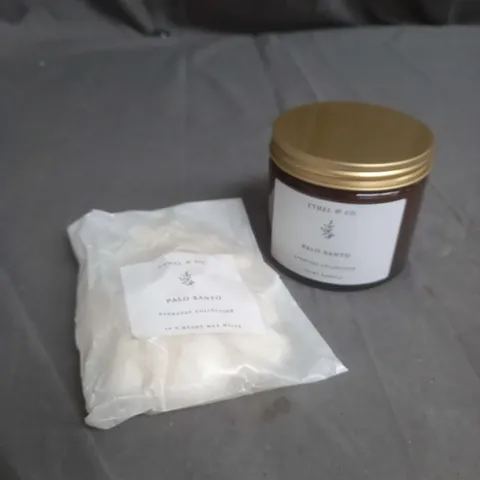 LOT OF 2 ETHEL&CO PRODUCTS TO INCLUDE PALO SANTO 250ML CANDLE AND PALO SANTO HEART WAX MELTS