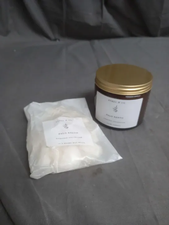 LOT OF 2 ETHEL&CO PRODUCTS TO INCLUDE PALO SANTO 250ML CANDLE AND PALO SANTO HEART WAX MELTS