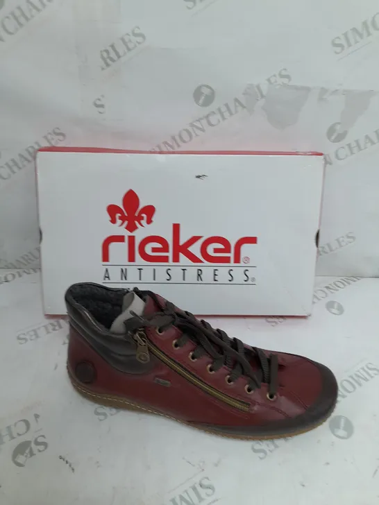 BOXED PAIR OF RIEKER SIDE ZIP WATER RESISTANT BOOTS IN BURGUNDY SIZE 8