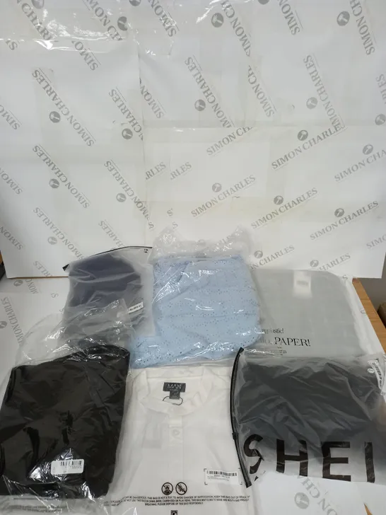 LARGE BOX OF ASSORTED CLOTHING ITEMS IN VARIOUS COLOURS AND SIZES INCLUDING TROUSERS , TOPS AND JUMPERS 