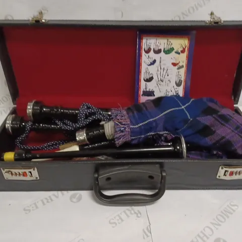 LOT TO CONTAIN A BAGPIPE SET, INCLUDES CARRY CASE, THE BAGPIPE TUTOR VOLUME 1 & OTHER ACCESSORIES 