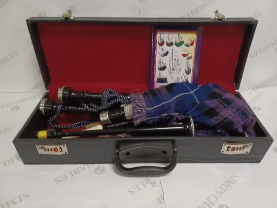 LOT TO CONTAIN A BAGPIPE SET, INCLUDES CARRY CASE, THE BAGPIPE TUTOR VOLUME 1 & OTHER ACCESSORIES 