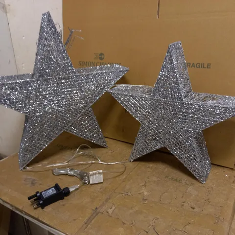 HR PRE LIT SET OF 2 OVERSIZED GLITTER STARS 