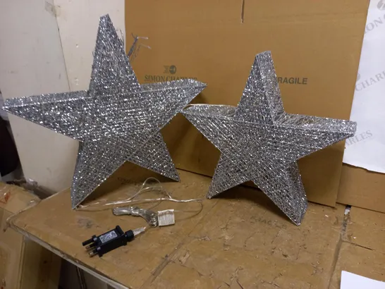 HR PRE LIT SET OF 2 OVERSIZED GLITTER STARS 