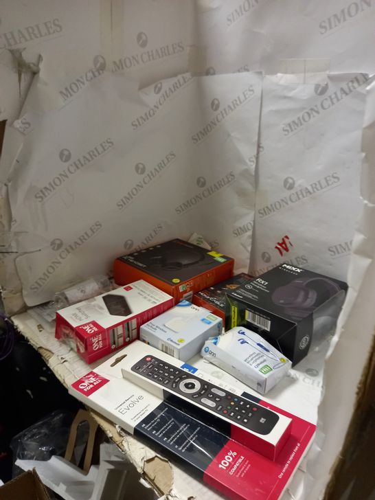 LOT OF APPROXIMATELY 10 ASSORTED ITEMS INCLUDING TV REMOTES , HEADPHONES , AND PHONE CHARGERS 