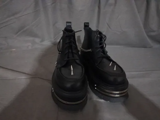 PAIR OF KOI LACE UP BOOTS IN BLACK SIZE 6