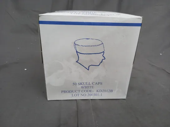 A BOX OF APPROXIMMATELY 50 WHITE, UNBRANDED SKULL CAPS 