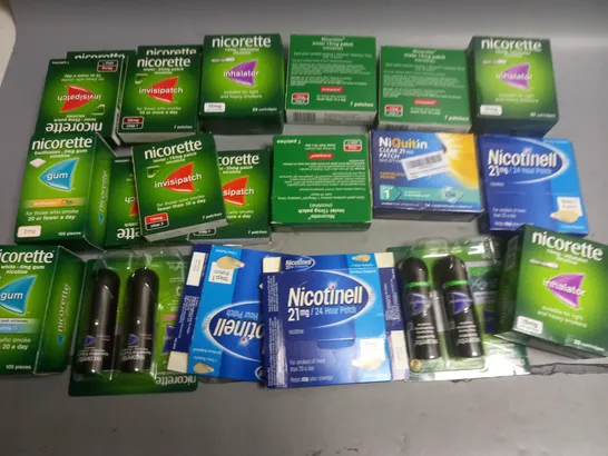 LOT OF APPROXIMATELY 35 ASSORTED QUIT SMOKING AIDS TO INCLUDE NICORETTE AND NICOTINELL