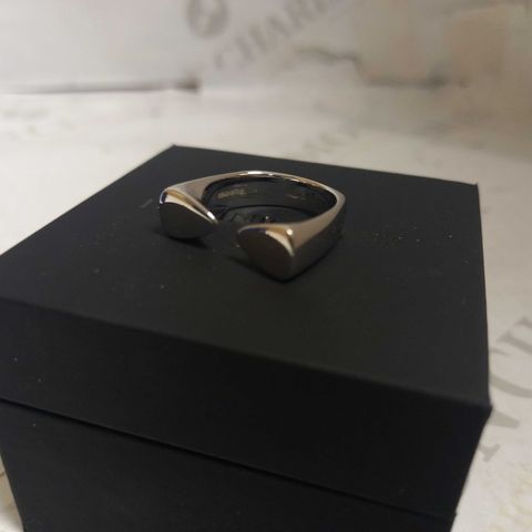 DOMINIC JONES SILVER TOOTH RING
