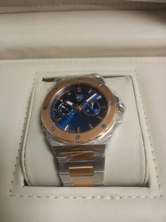 BOXED RAYMOND GAUDIN WATCH IN BLUE/GOLD/SILVER