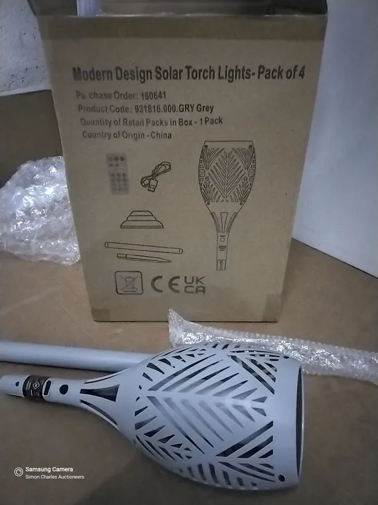 BOXED SET OF FOUR LED SOLAR TORCH LIGHTS