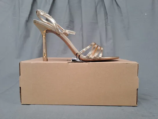 BOXED PAIR OF MNG OPEN TOE HIGH HEEL SANDALS IN METALLIC GOLD UK SIZE 6