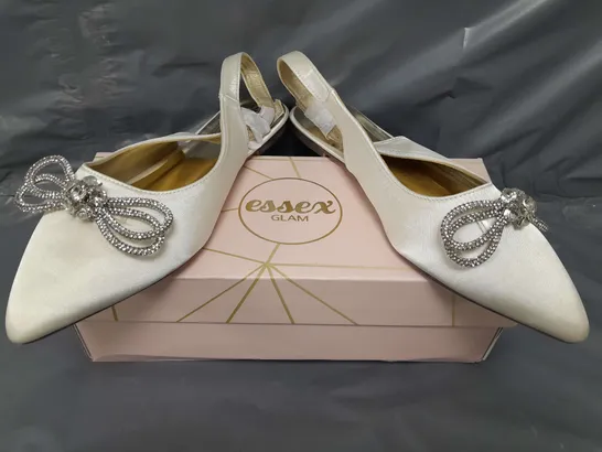 BOXED PAIR OF ESSEX GLAM POINTED TOE FLAT SHOES IN IVORY SATIN UK SIZE 6