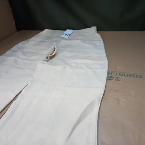 PAIR OF CREAM COTTON TROUSERS - XL