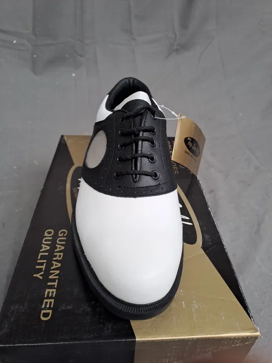 BOX OF APPROXIMATLY 12 BLACK AND WHITE TOP LINE GOLF SHOES VARIOUS SIZES 