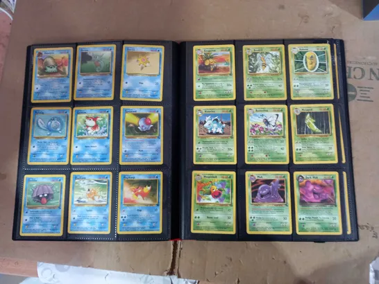 BINDER CONTAINING OVER 200 POKEMON CARDS