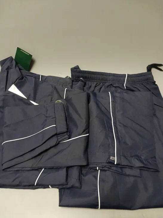 APPROXIMATELY 10 ASSORTED SPORTS CLOTHING PRODUCTS IN VARIOUS SIZES TO INCLUDE TRACKSUITS, SHORTS, TSHIRTS ETC 