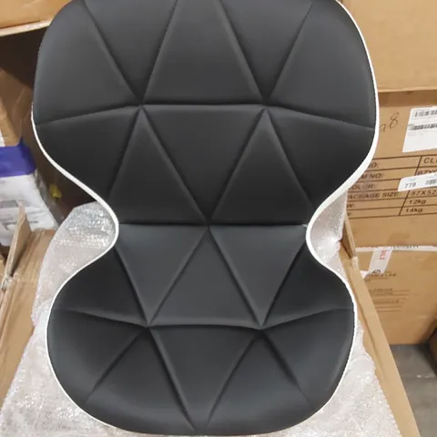 A BOXED BLACK AND WHITE UPHOLSTERED OFFICE CHAIR 