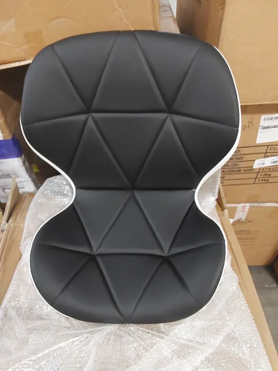 A BOXED BLACK AND WHITE UPHOLSTERED OFFICE CHAIR 