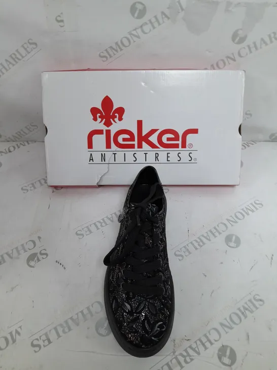 BOXED PAIR OF RIEKER FLORAL TRAINERS IN BLACK SIZE 4