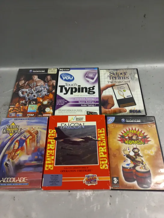 APPROXIMATELY 6 ASSORTED RETRO VIDEOS GAMES TO INCLUDE DONKEY KONG, SUMMER CHALLENGE, CRUSH HOUR ETC 