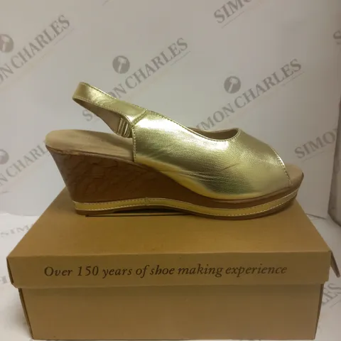 BOXED PAIR OF CUSHION WALK GOLD STRAPPY WEDGE HEELED SHOES - SIZE 7