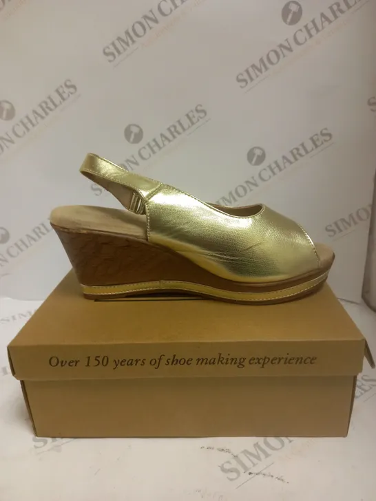 BOXED PAIR OF CUSHION WALK GOLD STRAPPY WEDGE HEELED SHOES - SIZE 7