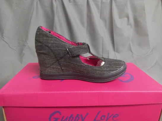 BOX OF APPROXIMATELY 12 BLACK  GUPPY LOVE BY BLOWFISH SHOES IN VARIOUS SIZES 