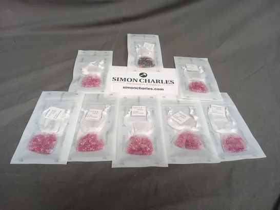 EIGHT ASSORTED BAGS OF SWAROVSKI GEMS