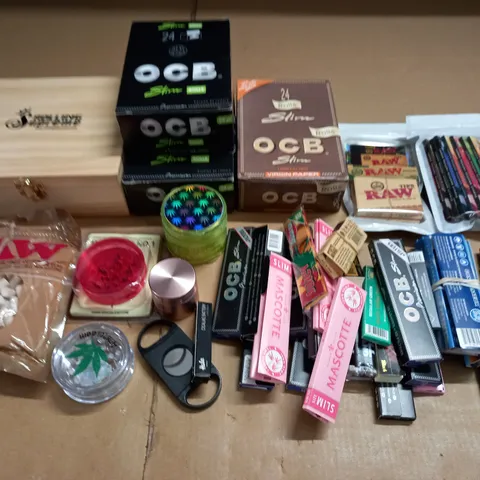 LOT OF ASSORTED SMOKING ACCESSORIES TO INCLUDE RIZLAS, GRINDERS, FILTERS AND MORE