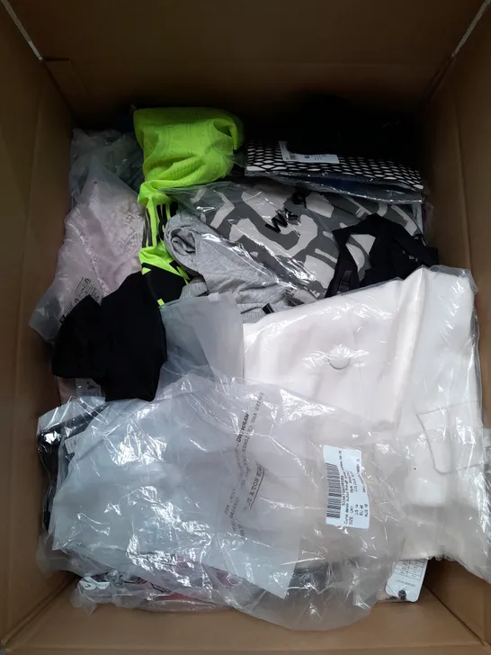 BOX OF APPROXIMATELY 25 ASSORTED CLOTHING ITEMS TO INCLUDE - DRESSES, SHORTS, TROUSERS ETC