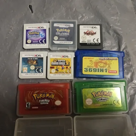 LOT OF 8 ASSORED NINTEDO DS & 3DS GAMES TO INCLUDE POKEMON MOON, BLACK AND LEAF AND SUPER MARIO BROS 2