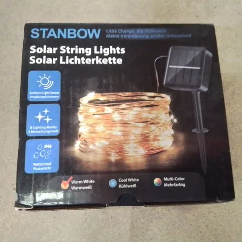 A BOX OF SOLAR POWERED STRING LIGHTS 