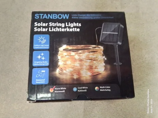 A BOX OF SOLAR POWERED STRING LIGHTS 