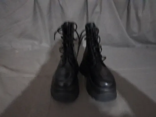 PAIR OF KOI LACE UP BOOTS IN BLACK SIZE 6 