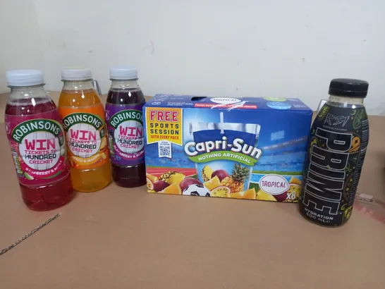 LOT OF 12 ASSORTED DRINKS TO INCLUDE CAPRI SUN, PRIME AND ROBINSONS